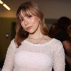 Foto mostra a jornalista Bruna Furlan com blusa branca.
